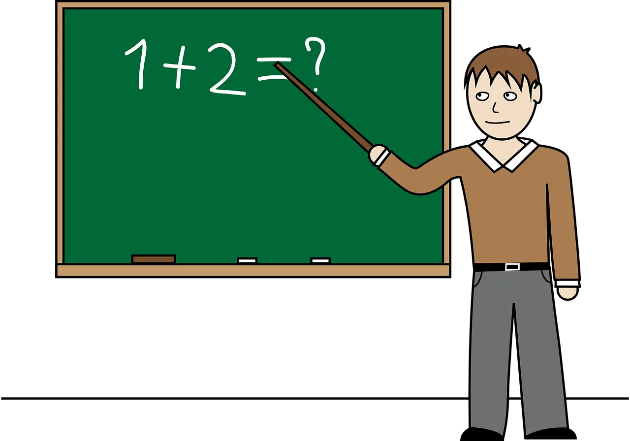 Elementary Mathematics Teacher Pointing at Addition Problem on Classroom Chalkboard