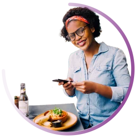 Cheerful Young Woman Enjoying a Meal Time Clipart with Smartphone Interaction