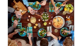Heartwarming Family Gathering Around Dinner Table Meal Time Clipart Scene