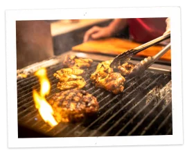 Sizzling Grill Flames Clipart: Juicy Meat Cooking on Fiery Barbecue Grate