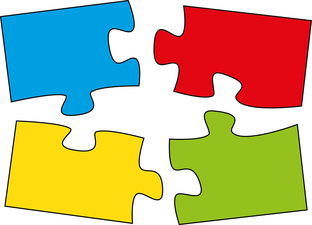 Colorful Interlocking Puzzle Pieces Clipart Representing Teamwork and Collaboration