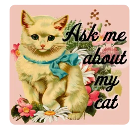 Adorable Vintage-Inspired Kitten with Blue Bow Surrounded by Delicate Floral Clipart