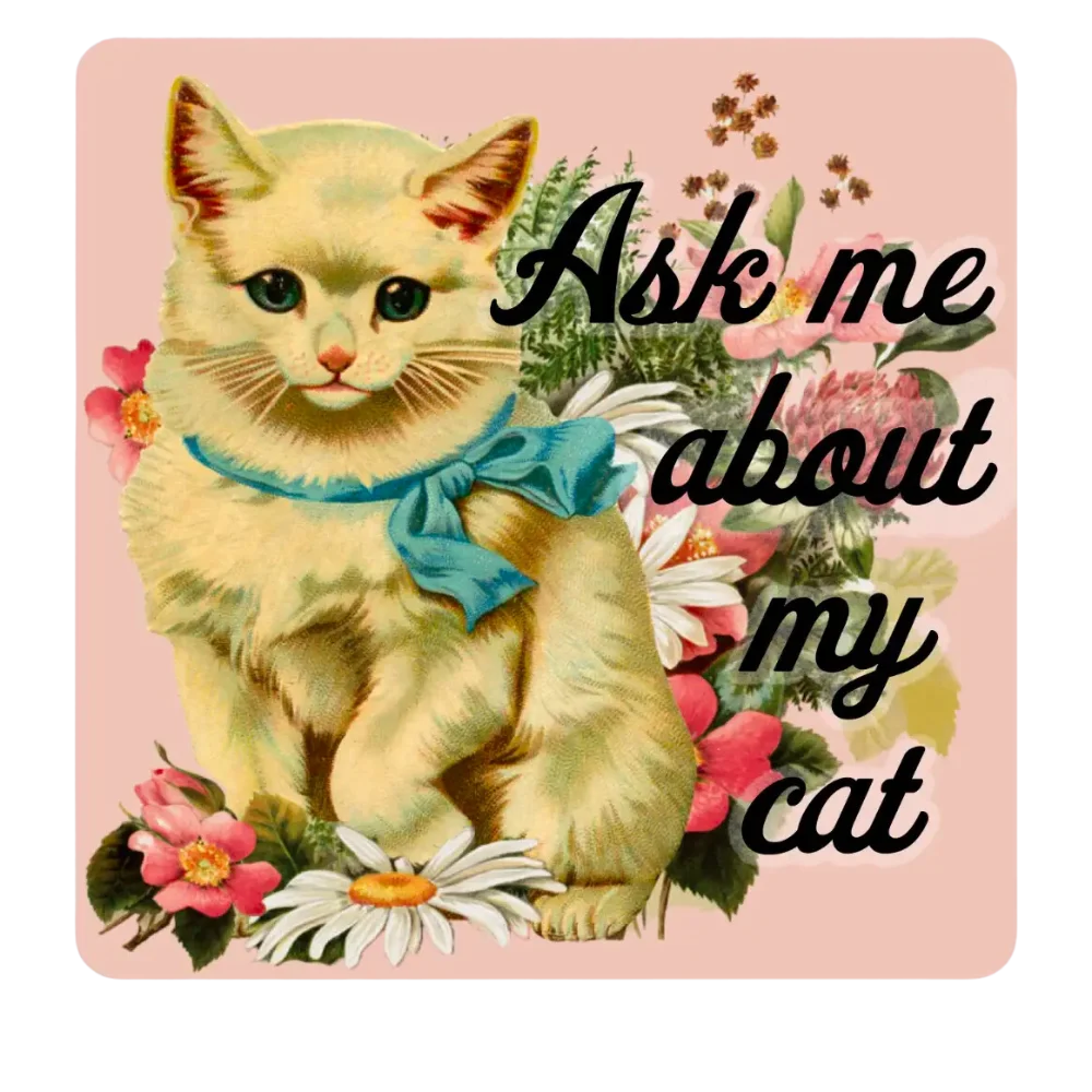 Adorable Vintage-Inspired Kitten with Blue Bow Surrounded by Delicate Floral Clipart