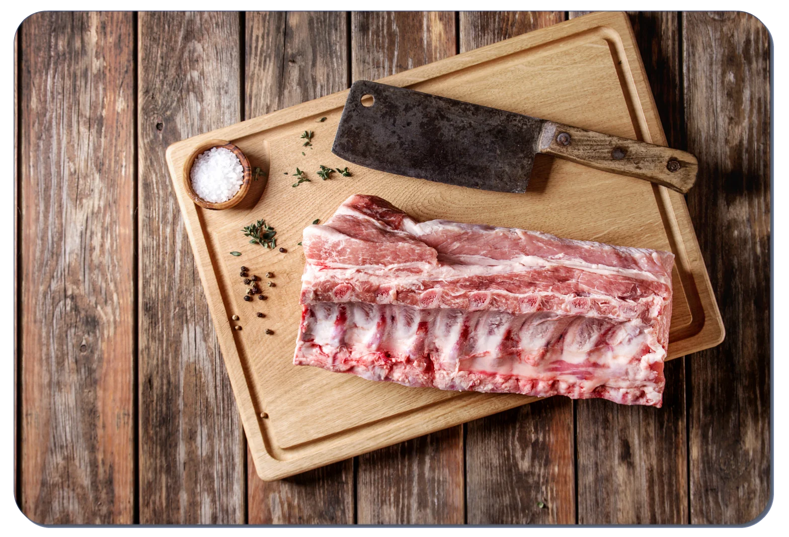 Raw Pork Ribs Clipart on Rustic Wooden Cutting Board with Butcher Knife