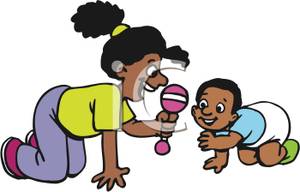 baby playing African american mother holding a rattle and playing with her baby jpg