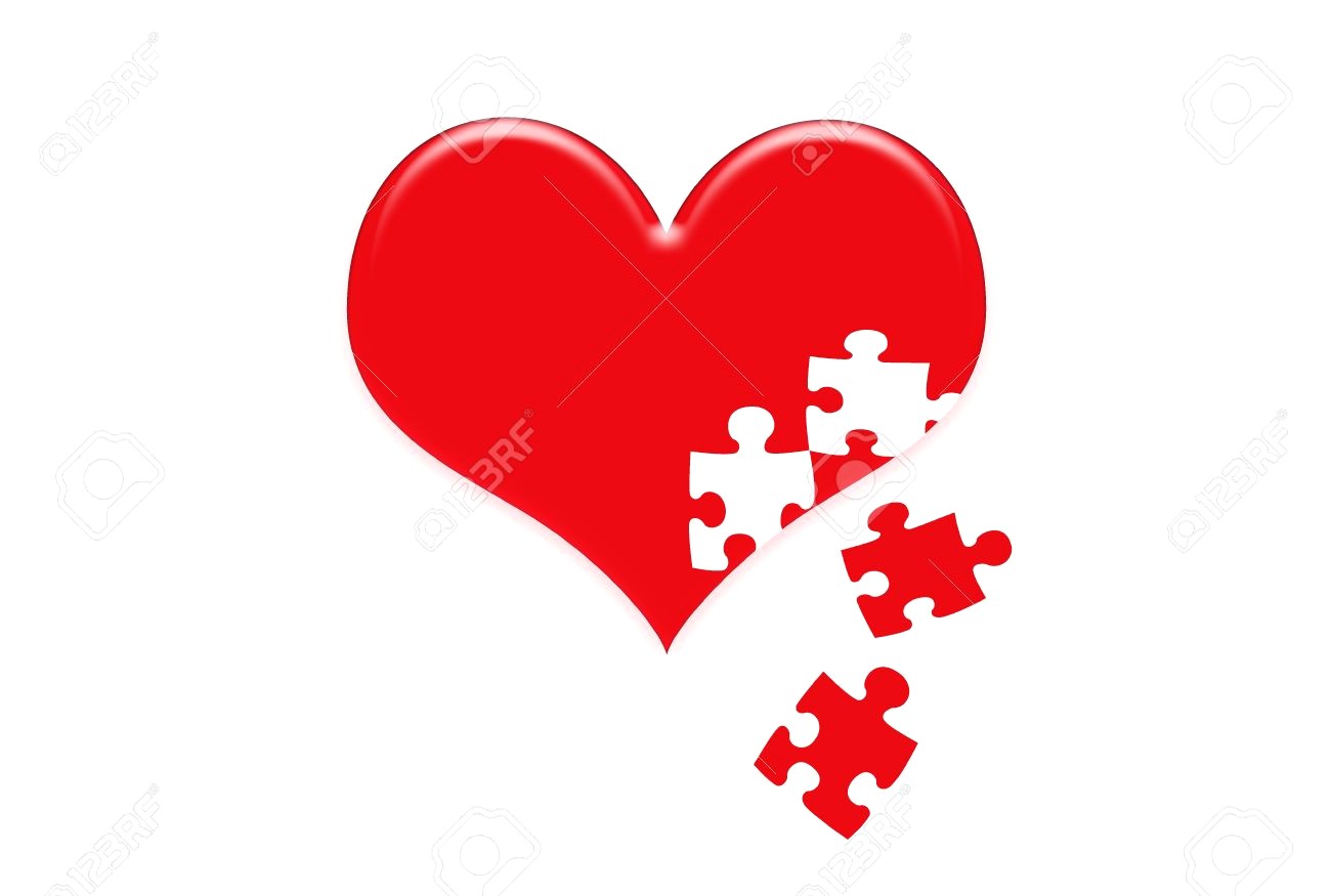 Heart jigsaw puzzle in the red clipart jpg